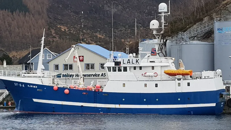 Fishing vessel moored at the quay between trips